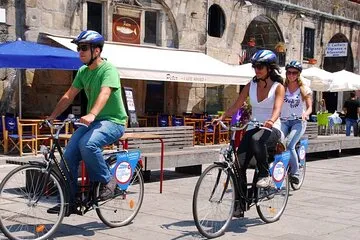 Cyclists gathered at a meeting point before a group departure
